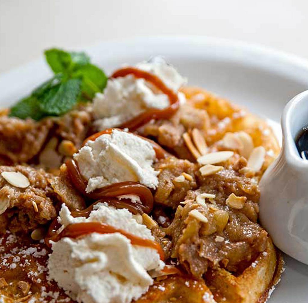 Belgica · Caramelized apples, toasted almonds, and caramel.