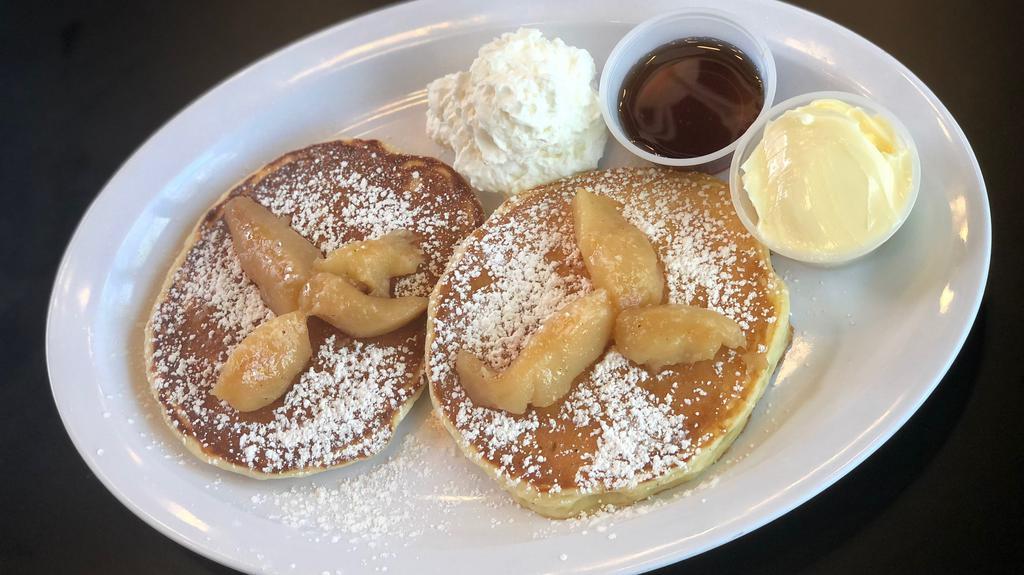 L'Hermitage Pancakes · 2 buttermilk pancakes served with caramelized apples, date butter, and pancake syrup.