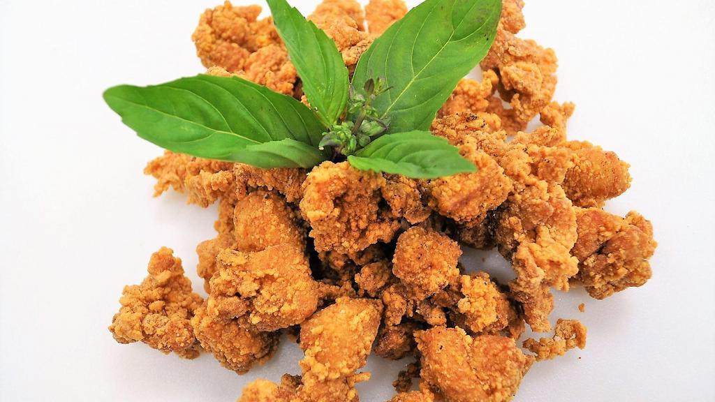 Honey Popcorn Chicken · House-marinated, Hand Breaded,  Flash Fried Basil, Tossed in House Honey Sauce