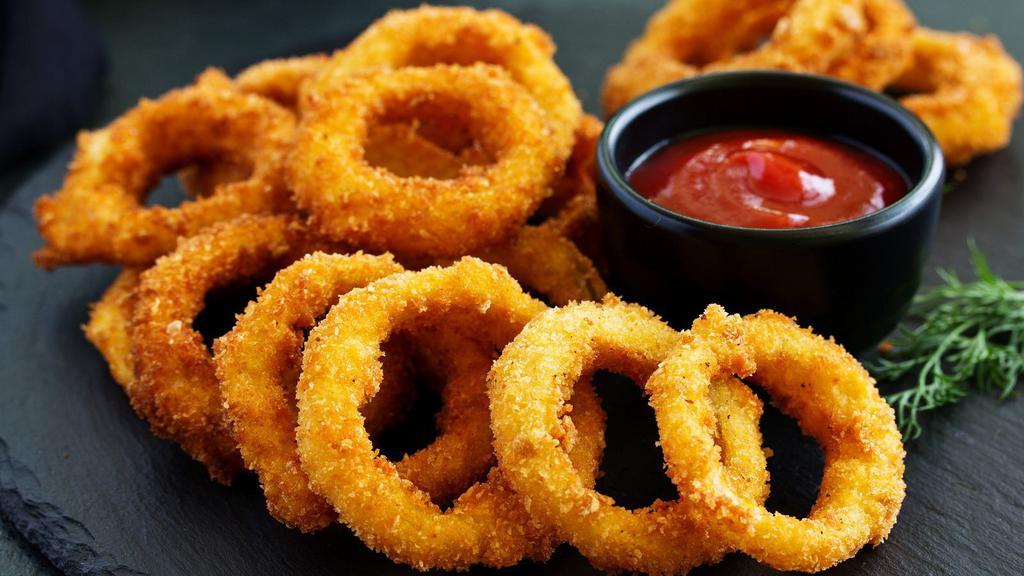 Onion Rings · Cross sectional rings of onion dipped in batter and the deep fried.