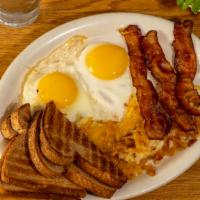 2 Eggs with Bacon · Served with hash browns and toast.