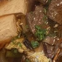 Beef Sukiyaki Teishoku · Beef stew with konnyaku noodle, vegetables, tofu in a sweet soy sauce based broth and some s...