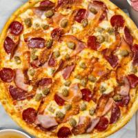 Metric Meat Pizza · Pizza sauce, cheese blend, pepperoni, sausage, ham.