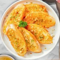 The Last Garlic Bread · Bread toasted with butter and fresh garlic.