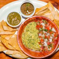Totopos and Salsa · Fresh housemade chips, salsa variety, and guacamole