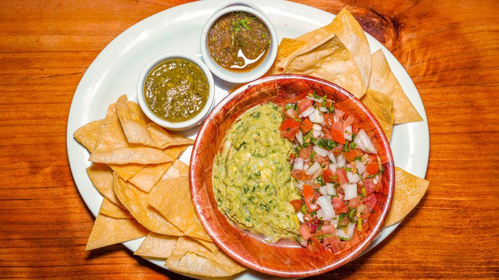 Totopos and Salsa · Fresh housemade chips, salsa variety, and guacamole