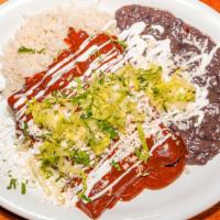 Enchiladas de Mole Poblano (2pcs) · Two enchiladas filled with melted cheese, and choice of chicken, carnitas or cheese only, to...
