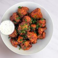 Sweet & Sour Cauliflower Wings · Gluten-free, vegan cauliflower wings tossed in our sweet and sour sauce and served with hous...