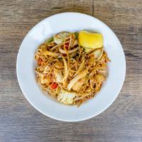 Wok Fried Burmese Spicy Noodle · Choice of tofu, chicken or shrimps, egg (or rice) noodle, cabbage, onion, bell pepper, cooke...