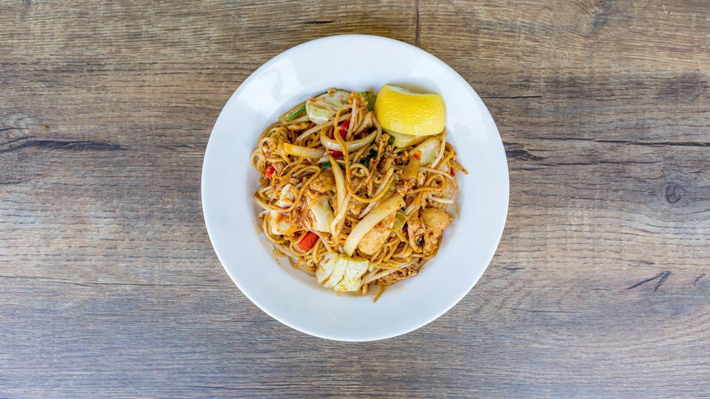 Wok Fried Burmese Spicy Noodle · Choice of tofu, chicken or shrimps, egg (or rice) noodle, cabbage, onion, bell pepper, cooked with chili sauce. Gluten free available.