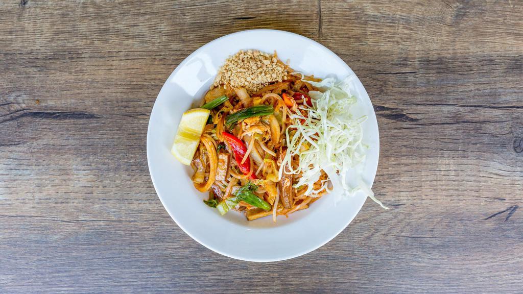 Burmese Pad Thai · Gluten free. Choice of tofu, chicken or shrimps, stir fried rice noodle tofu, red bell peppers, onions, lettuce, cabbage, peanuts, bean sprout and scrambled eggs.