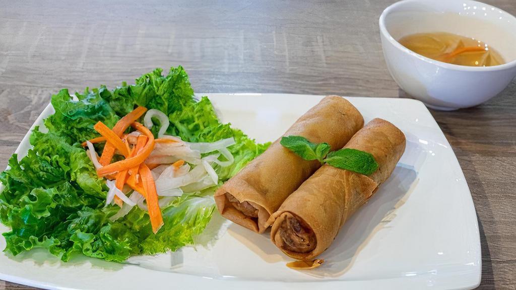 A1. Egg Rolls · Deep fried rolls filled with ground pork, carrot, taro, onion, mushroom and noodle.