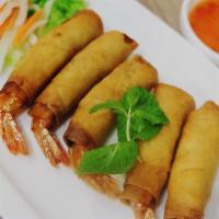 A4. Shrimp Rolls · Deep fried whole shrimp rolls served with sweet and sour sauce.