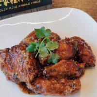 A11. Original Dry Fried Chicken Wing (8) · Spicy. Come with spicy garlic sauce.