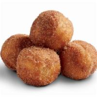 Donut Bites · Crispy Donut Bites sprinkled with cinnamon sugar. Perfect for breakfast or a grab-and-go sna...