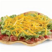 Crunchtada® Tostada · The original Crunchtada®! A thick, wavy, crunchy corn shell layered with slow-cooked beans m...