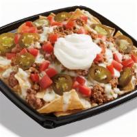 Queso Loaded Nachos · Loaded with choice of seasoned beef, freshly grilled, marinated chicken or freshly grilled c...