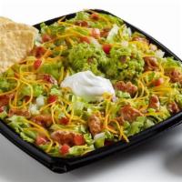 Taco Salad With Fresh Guac – Grilled Chicken  · Freshly grilled, marinated chicken, freshly grated cheddar cheese, fresh house-made guacamol...