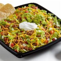 Taco Salad With Fresh Guac – Beyond Meat · Seasoned Beyond Meat® plant-based crumbles, freshly grated cheddar cheese, fresh house-made ...