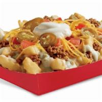 Queso Loaded Fries · Crinkle Cut Fries topped with seasoned beef, signature creamy Queso Blanco, freshly grated c...