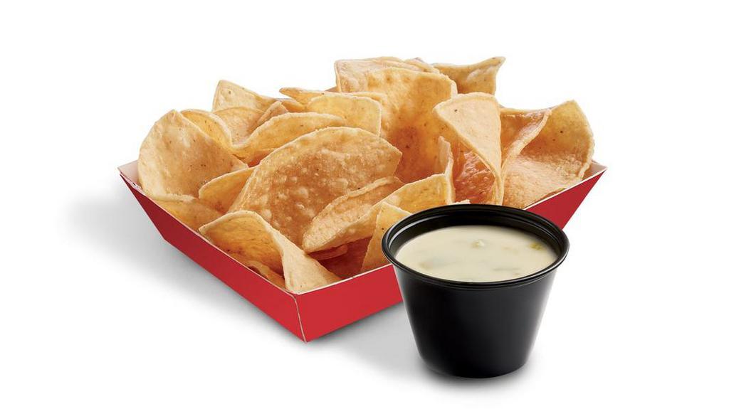 Chips & Queso (Snack) · Signature creamy Queso Blanco served with fresh house-made tortilla chips. Make it shareable by upsizing to a Large Chips & Queso Dip!