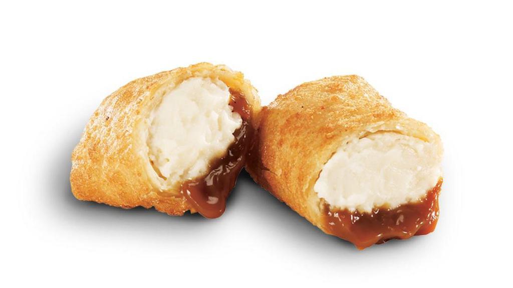 Caramel Cheesecake Bites · Piping hot bundles of sweet cheesecake and gooey caramel, enveloped in a light crispy shell. Choose from 2 Pc. or 4 Pc.