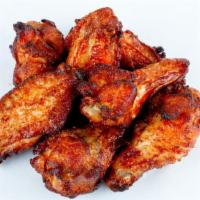 BBQ Chicken Wings · Un-breaded chicken wings, fried then tossed BBQ sauce.