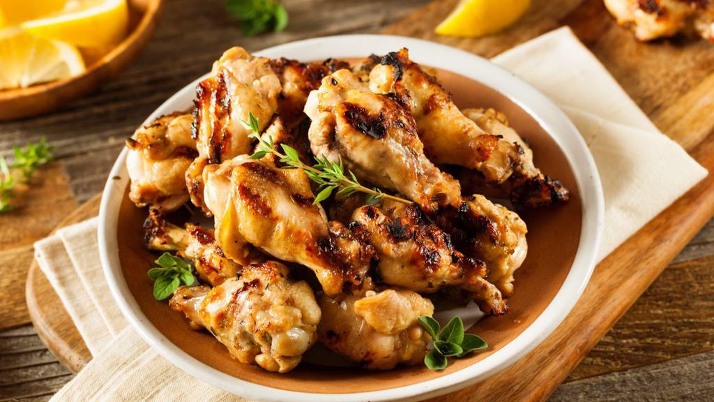 Garlic Chicken Wings · Un-breaded chicken wings, fried then tossed in garlic.
