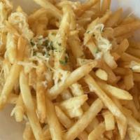 6. Garlic Cheese French Fries · Crispy french fries with garlic and cheese.