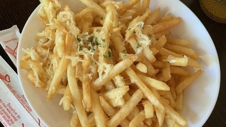 6. Garlic Cheese French Fries · Crispy french fries with garlic and cheese.