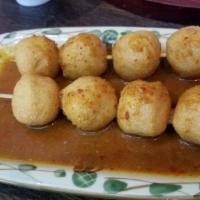 13. Curry Fish Balls · Fish balls with curry sauce. 8 pieces.