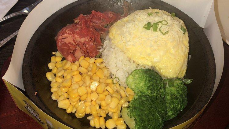 6. Cheesy Omelette Rice with Beef  · Cheesy omelette topped on rice, with cooked beef, broccoli, corn, served with choice of sauce