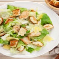 Caesar Salad · Fresh greens topped with freshly grated parmesan cheese, and herb croutons with a side of cr...