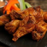 Cajun · 8 traditional wings tossed in Cajun dry rub (mild heat), served with carrots & celery and a ...