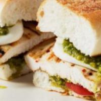 Chicken Pesto Melt · Griddled sandwich with melted mozzarella cheese, grilled chicken, pesto, tomato, on your cho...