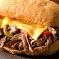 Philly Cheese Sandwich · Thinly sliced steak or chicken sauteed peppers and onion topped with melted white American c...