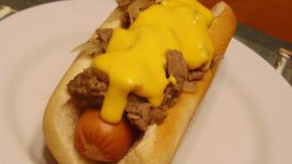 Philly Cheese Dog · Classic philly cheese paired with our juicy jumbo dog on a soft warm bun.