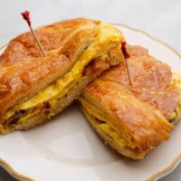 Breakfast Croissant · Egg, bacon, and cheddar cheese.