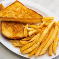 Grilled Cheese · melted cheddar cheese on white bread with side of fries.