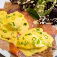 Crepe · Smoked Salmon, poached eggs, green onion an a crepe with hollandaise sauce.