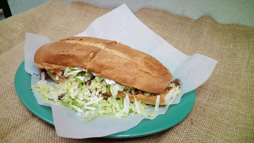Mexican Style Sandwich · Cheese, salsa, guacamole, sour cream, lettuce, and choice of meat.