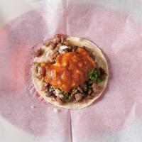 Soft Taco · Choice of meat, onions, cilantro, salsa.
