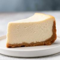 Cheesecake · Freshly made smooth cheesecake with a savory graham cracker crust.
