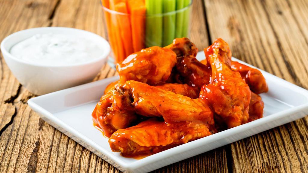 Hot Wings (12 Pc) · Fresh made hot wings served with ranch dip.