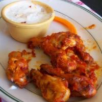 Wings · Baked Chicken Wings with carrots and celery sticks