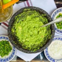 Guacamole · Avocado, onions, cilantro, jalapeños, and salt.