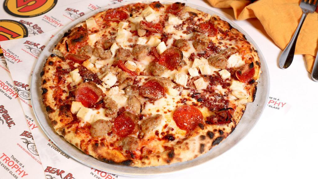 Meat Lovers Pizza · Mild Italian sausage, pepperoni , chicken, shredded mozzarella, parmesan