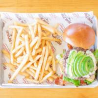 Black & Blue Burger · Crumbled blue cheese, avocado, creole remoulade, lettuce, tomato, onions, pickle.
