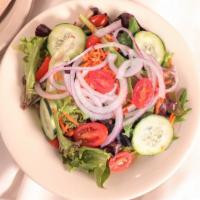 Small House Salad · Mixed Greens, tomatoes, carrots, cucumber, red onion. Served with a white balsamic vinaigret...