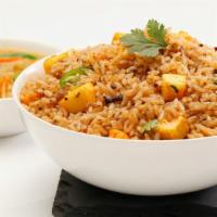 Paneer Biriyani · organic seeraga samba rice cooked with cottage cheese and hand-grounded spices to create an ...